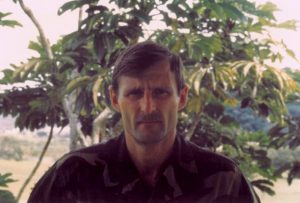 Paul Shemella in fatigues in jungle